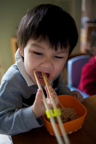 A Boy and His Trainer Chopsticks