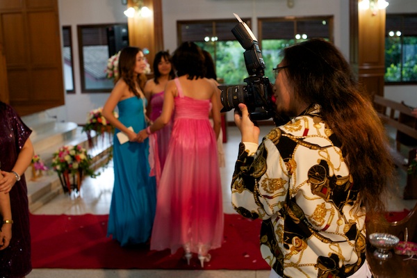 the photographer's clothing at a wedding